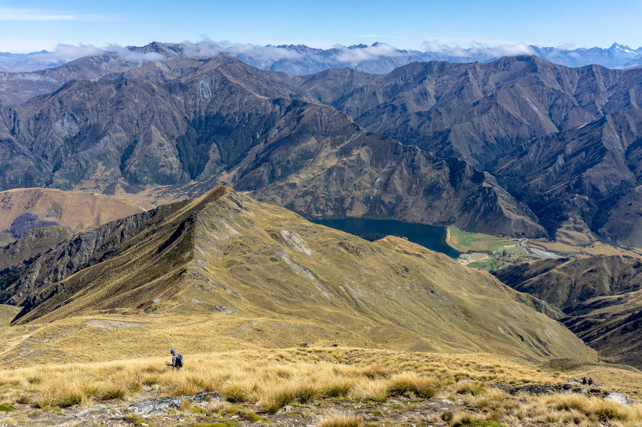 Photo of a hiker with Moke Lake in the background